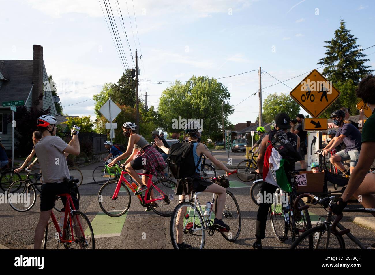Portland, Oregon, USA - June 10th, 2020: Hundreds of cycling rode through Northeast Portland to participate in the Black Lives Matter movement taking Stock Photo