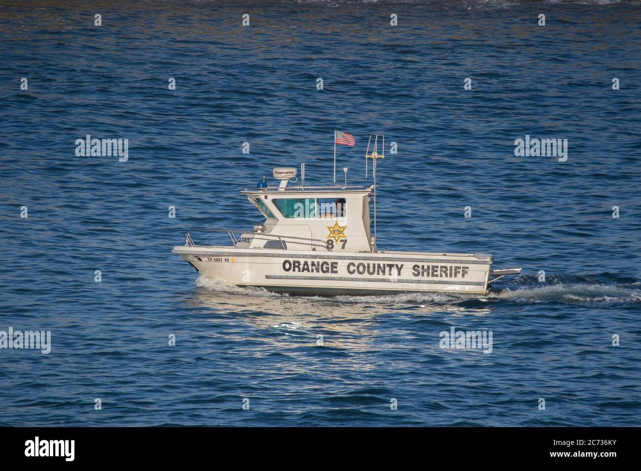 Orange County Sheriff department boat patrolling the coastal waters off