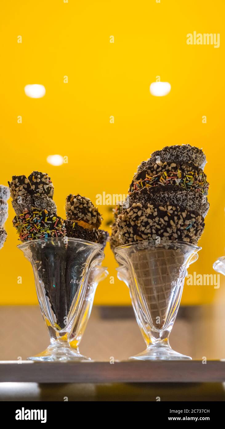 IceCream chocolate wafer with nut coating.confectionery and chocolate covered ice cream cones