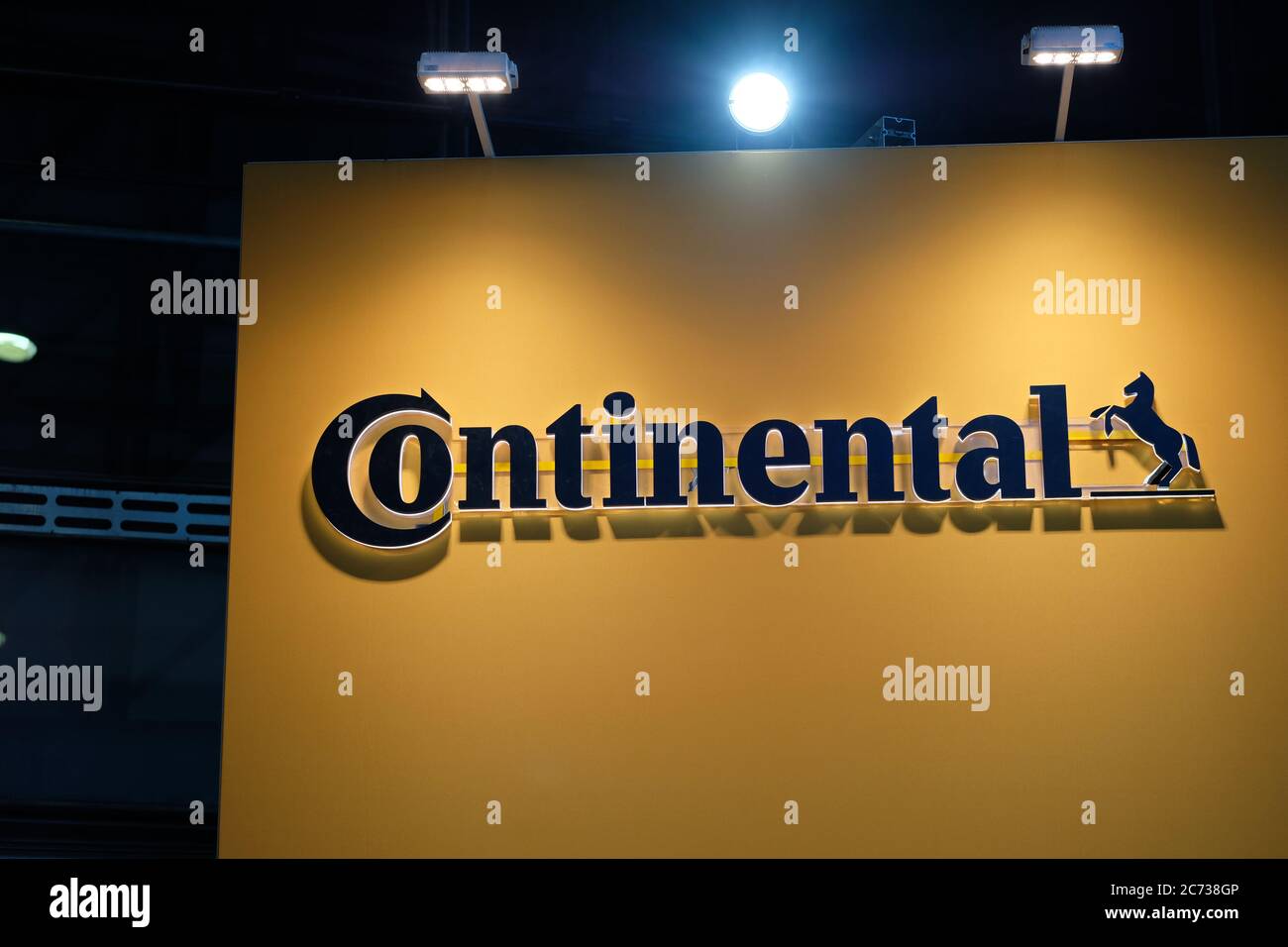 Continental Automotive logo on brown board. German automotive manufacturing car parts company. Supplier of automotive components. Stock Photo