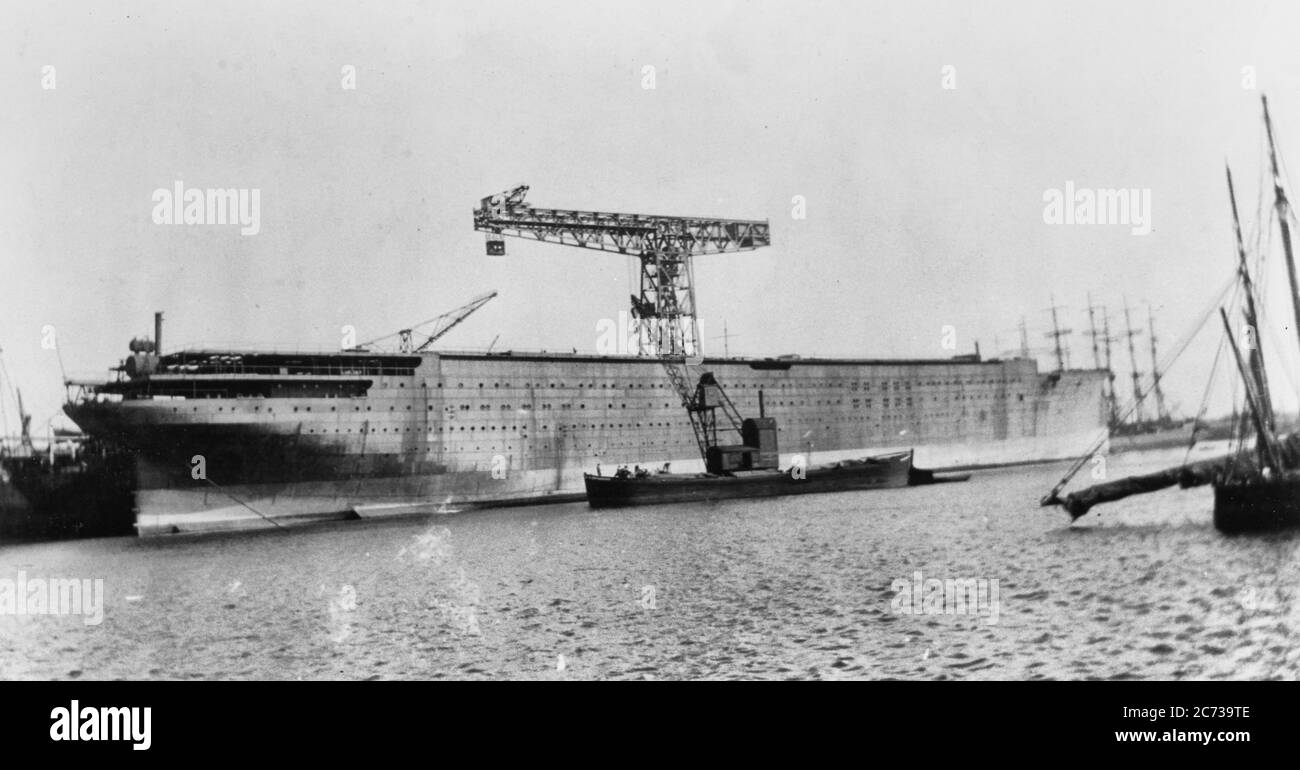 SS PARIS (French merchant passenger ship, 1921-1939) The French liner PARIS, lying at her builder's yard at St. Nazaire, France, incomplete, about 1917. PARIS was laid down in 1913 and launched 1916, but not completed due to World War I. Entered service 1921 and was destroyed by fire at Le Havre, 18 April 1939. Stock Photo