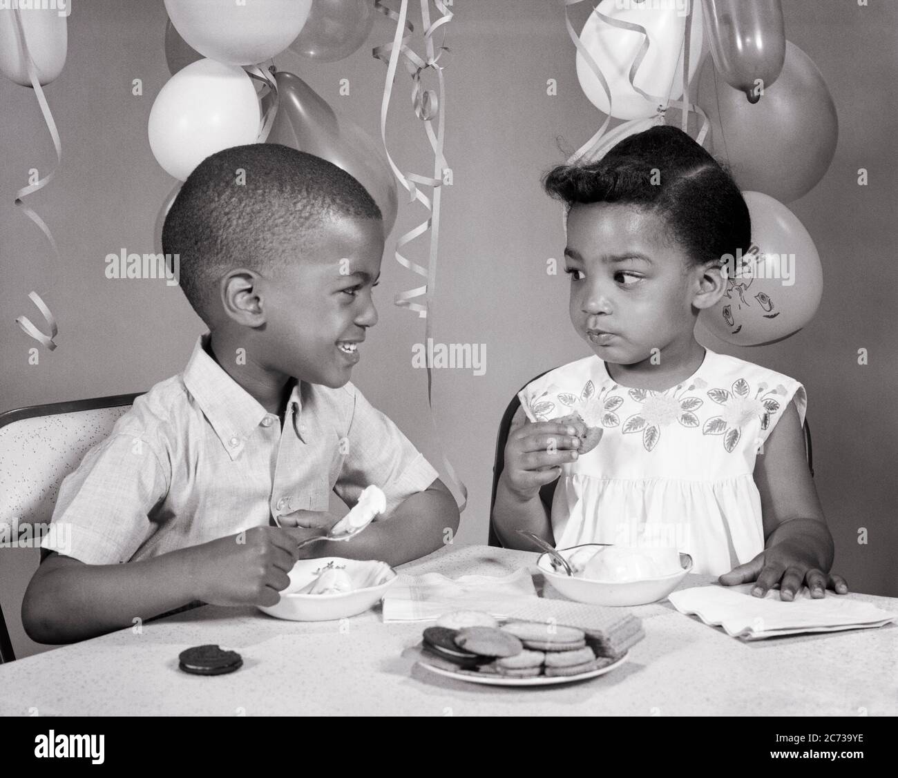 Vintage B&W photo of African-American brother and sister Vintage B&W photo of African-American brother and sister