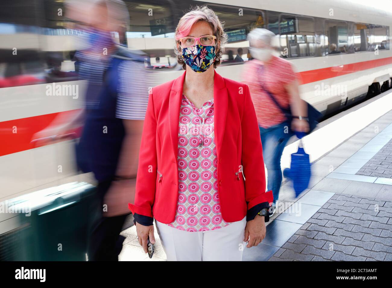 Mannheim, Germany. 09th July, 2020. Andrea Kadenbach, head of station management Mannheim, is standing in front of an arriving train on a platform in the main station. (to dpa: 'Only station manager rules over 146 stops') Credit: Uwe Anspach/dpa/Alamy Live News Stock Photo