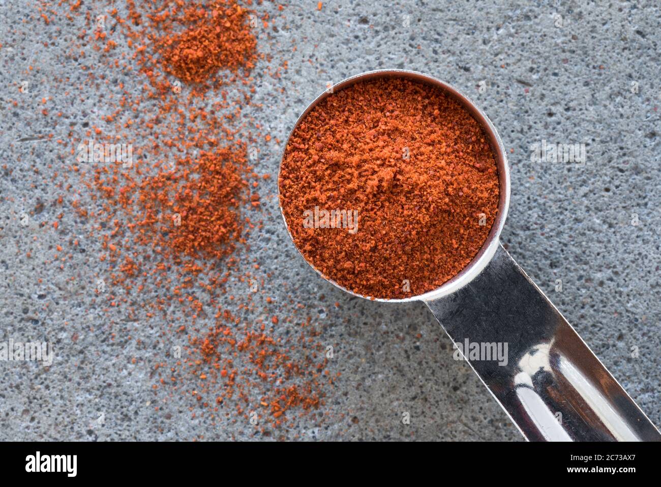 Ground Cayenne Pepper Spilled from a Teaspoon Stock Photo Alamy