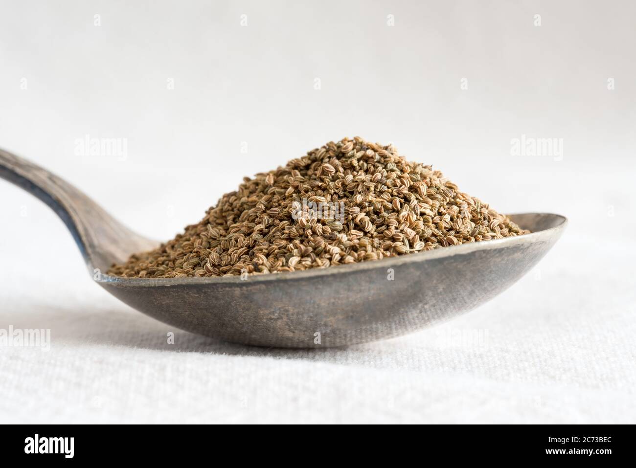 Anise Seeds on a Spoon Stock Photo