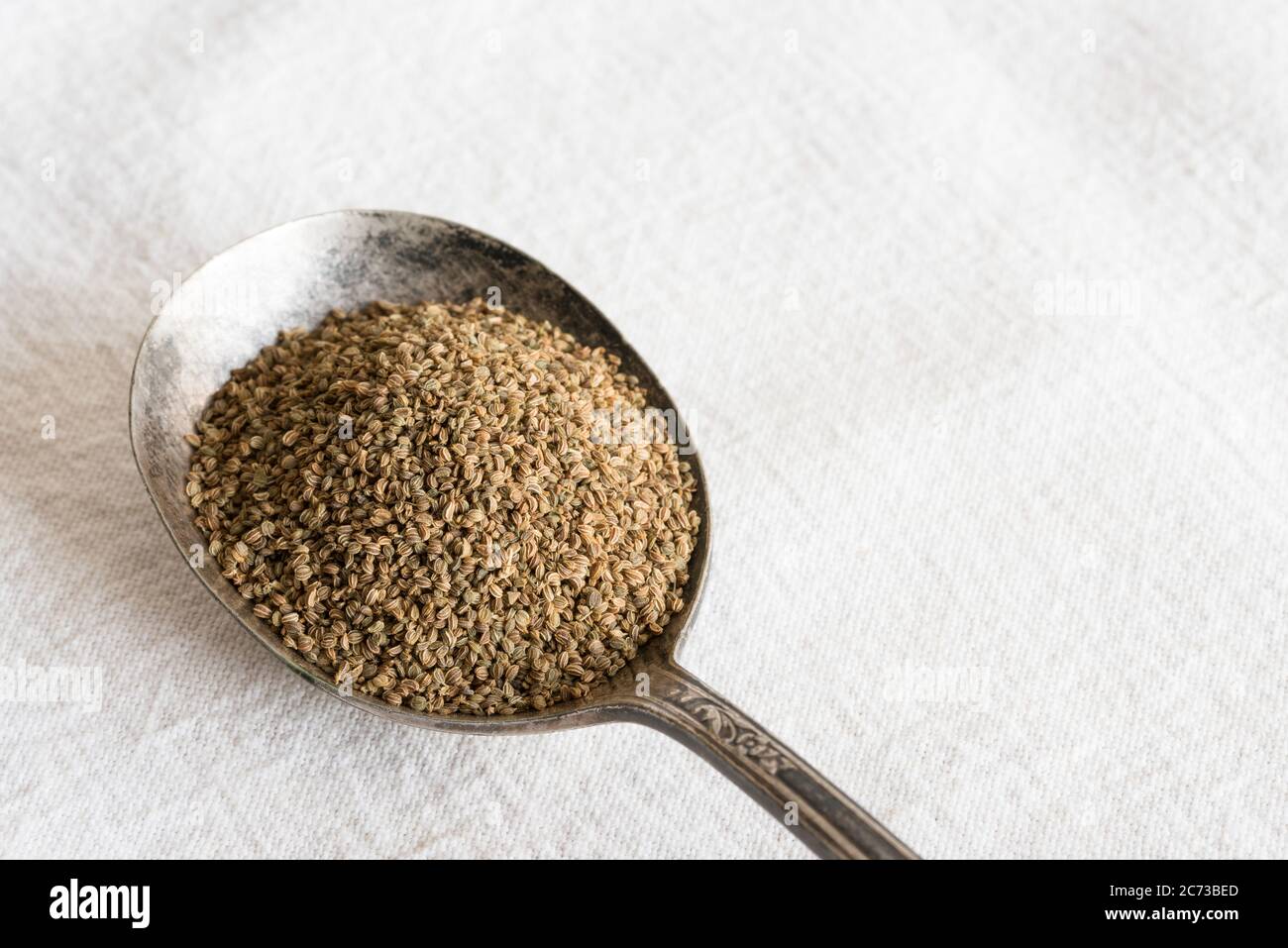 Anise Seeds on a Spoon Stock Photo