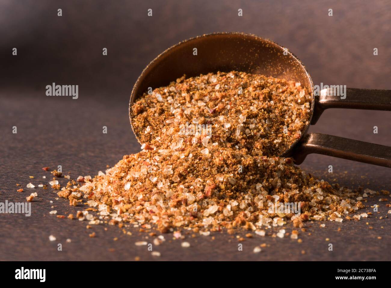 Chili Lime Seasoning Spilled from a Teaspoon Stock Photo