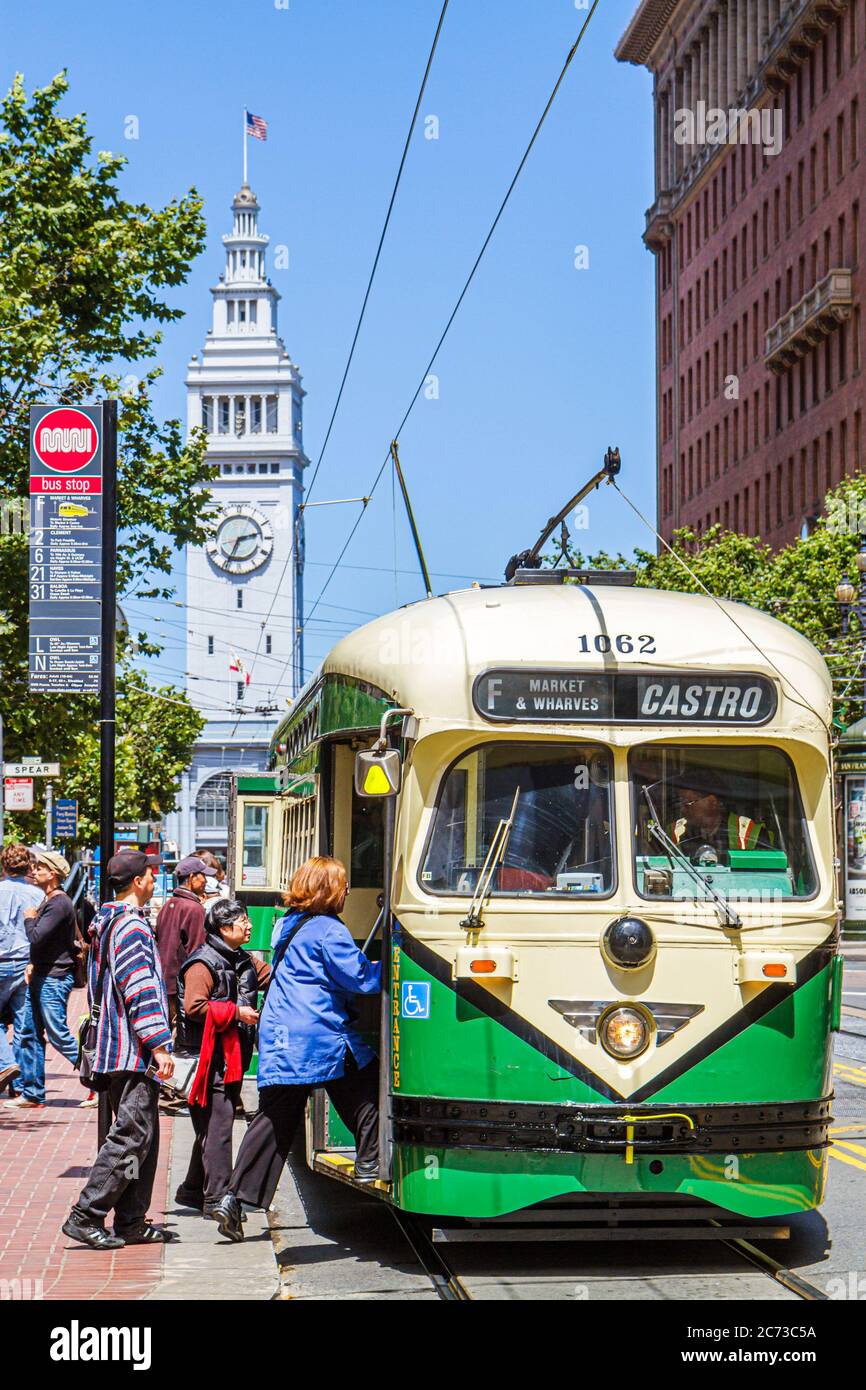 San Francisco California,Market Street,at Spear Street,101 The Embarcadero,Ferry building,1898,clock,electric streetcar,trolley pole,passenger rail,pu Stock Photo