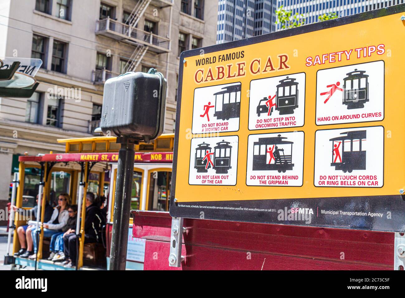 San Francisco California,Market Street,near Spear Street,cable car safety tips,sign,MTA,stop,passenger passengers rider riders,information,proper beha Stock Photo