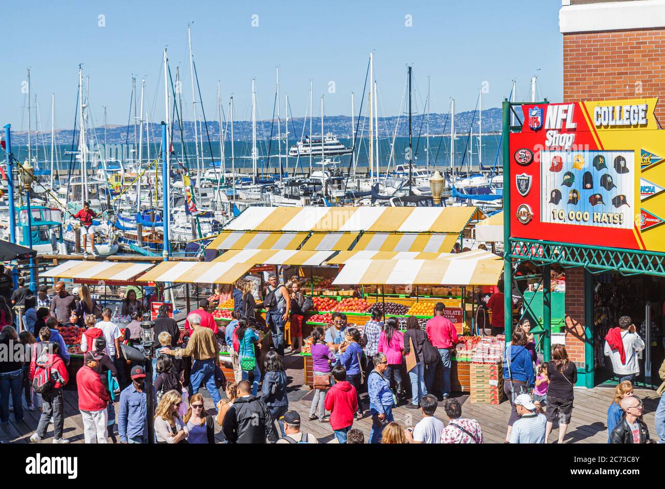 San Francisco California,The Embarcadero,Pier 39,entertainment,Fisherman's Wharf,water,shopping shopper shoppers shop shops market markets marketplace Stock Photo