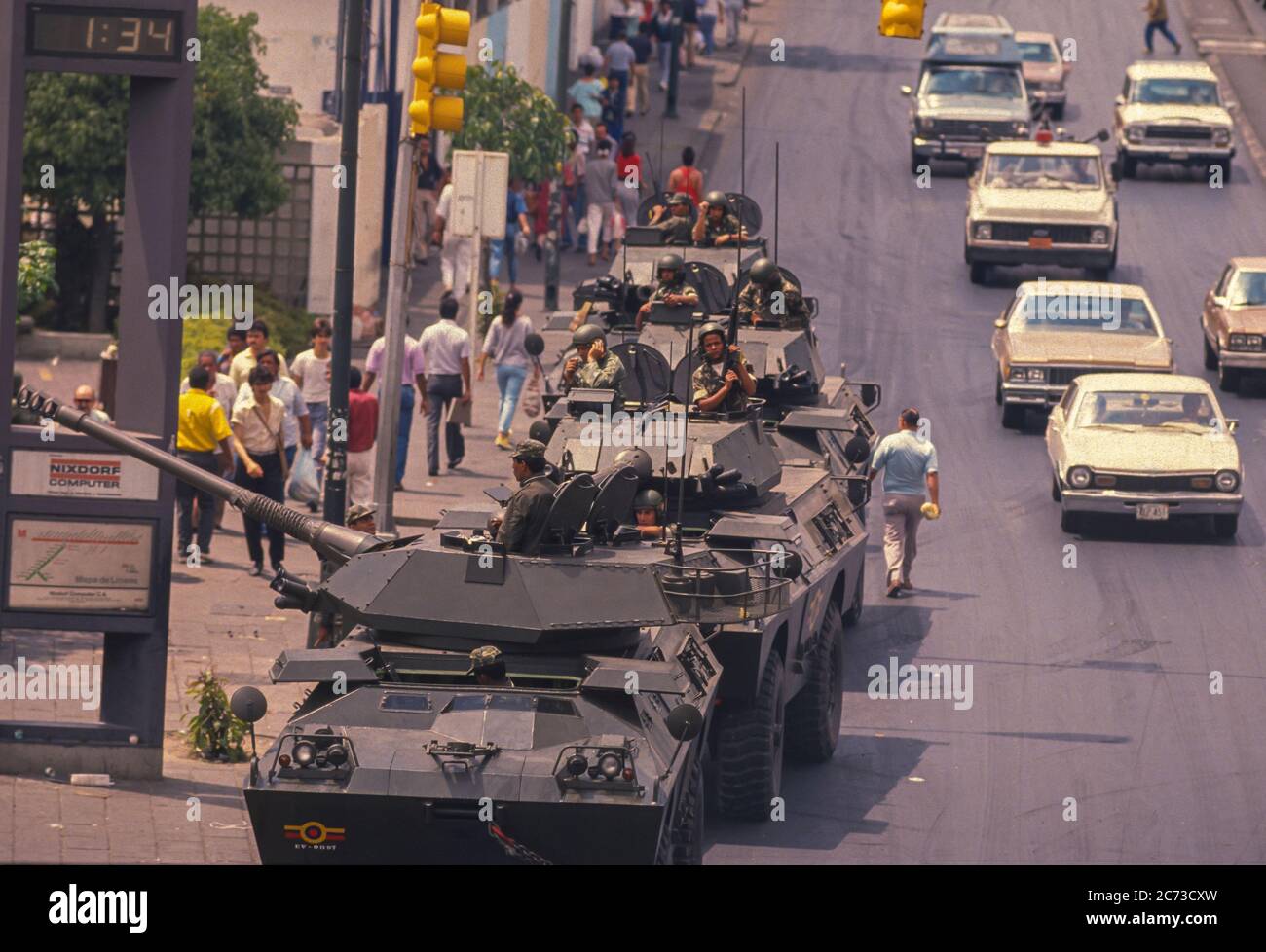 CARACAS, VENEZUELA, MARCH1989 - Soldiers in armored vehicles on street during state of emergency after protests, riots and looting in Caracas, know as the Caracazo. Stock Photo