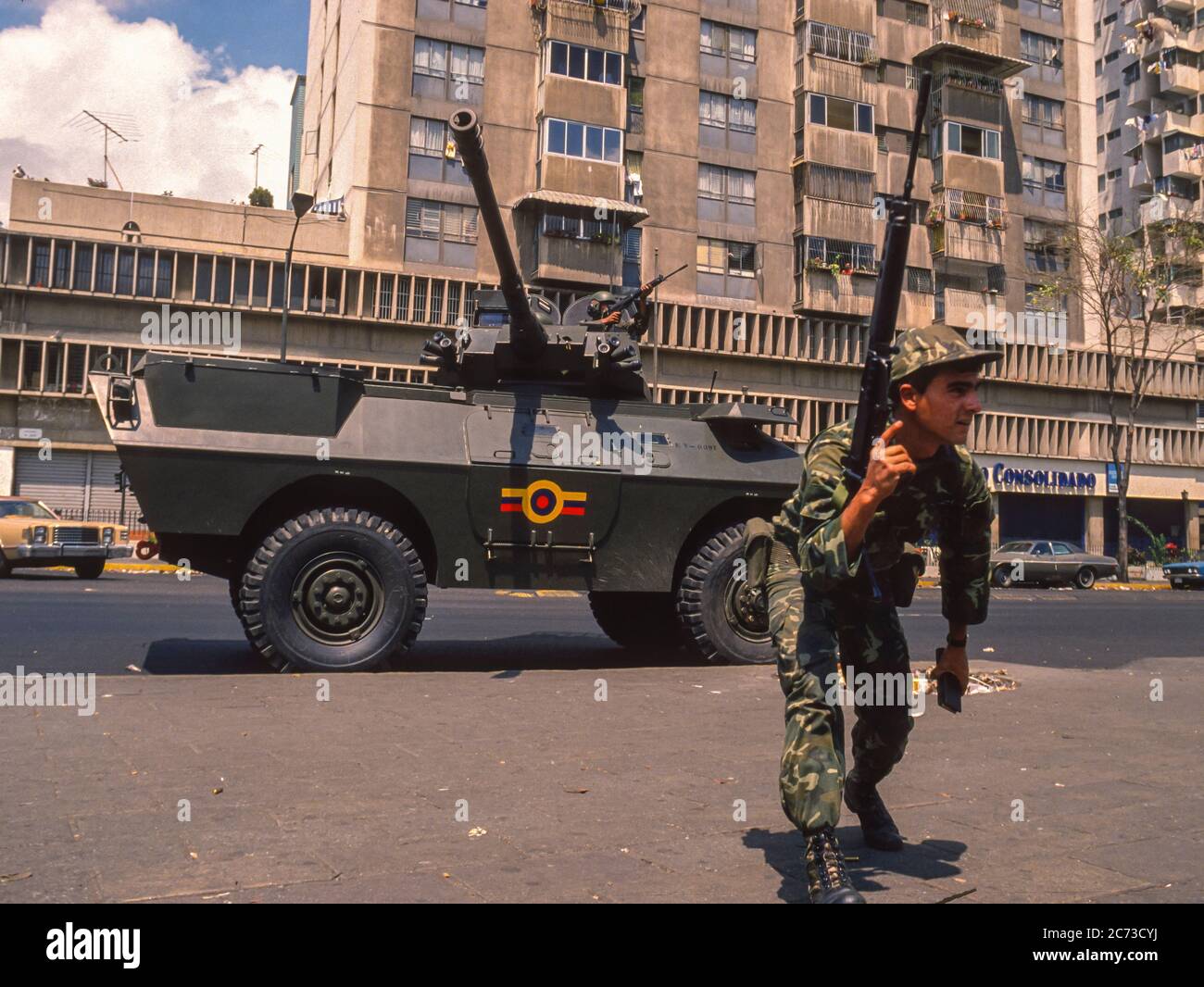 CARACAS, VENEZUELA, MARCH1989 - Soldiers in armored vehicles on street during state of emergency after protests, riots and looting in Caracas, know as the Caracazo. Stock Photo