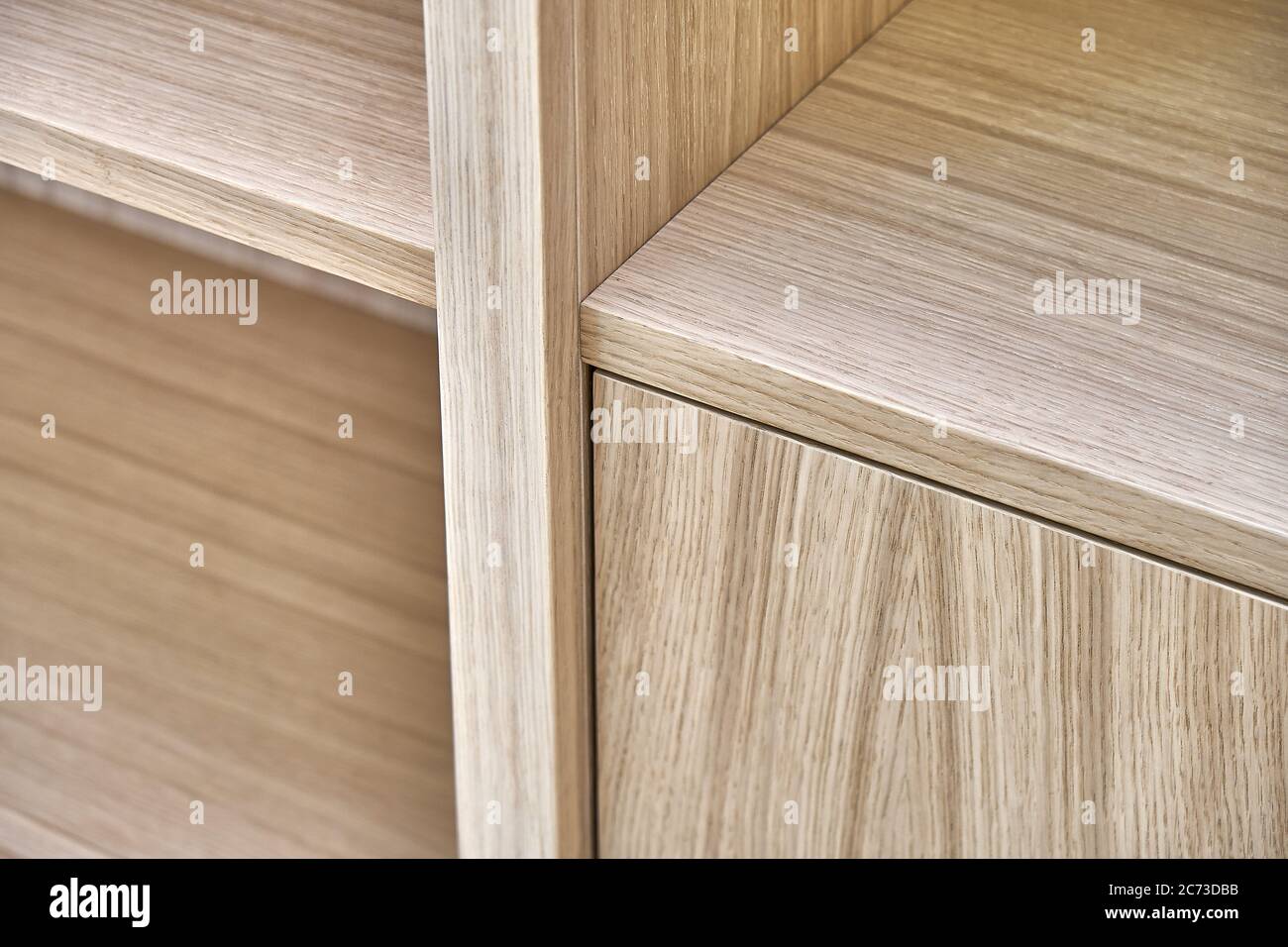 Wooden bookshelves. Wooden bookcases and wall panels made of oak