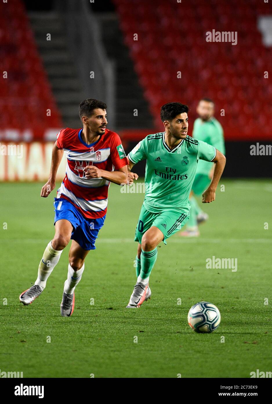 Granada Spain 13th July 2020 Real Madrid Player Marco Asensio And Granada Cf Player Gil Dias Are Seen In Action During The La Liga Santander Match Between Granada Cf And Real Madrid Final
