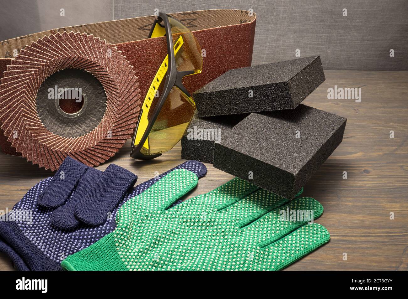 Different tools for sanding sanding belt, clamps, abrasive sponge and