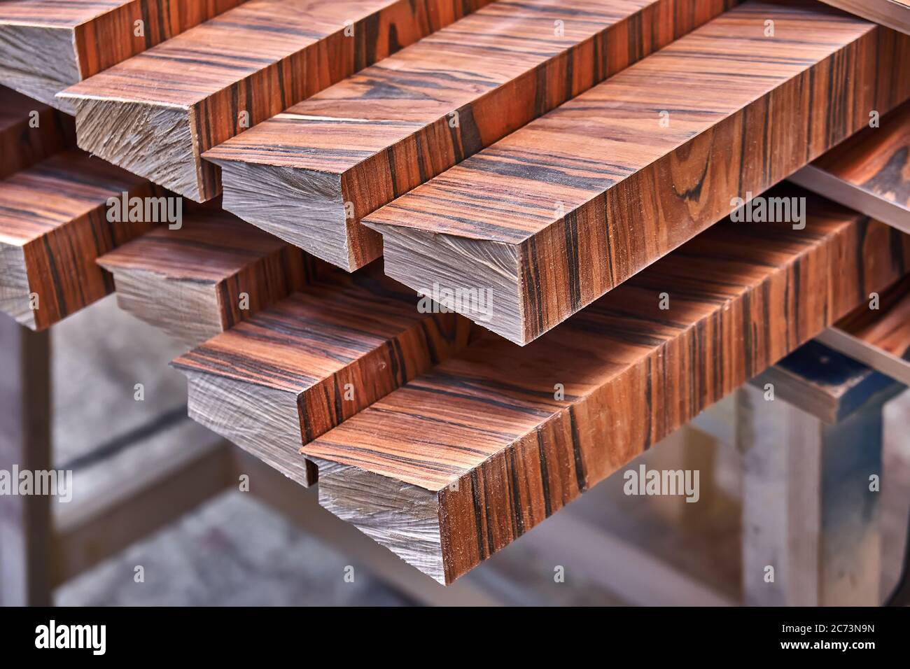 Joinery. Wood veneer wall panels elements are covered with dust