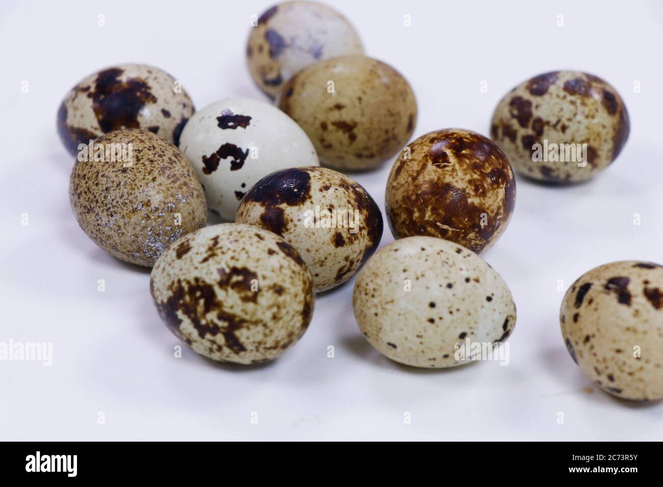 fresh quail eggs isolated on white background Stock Photo