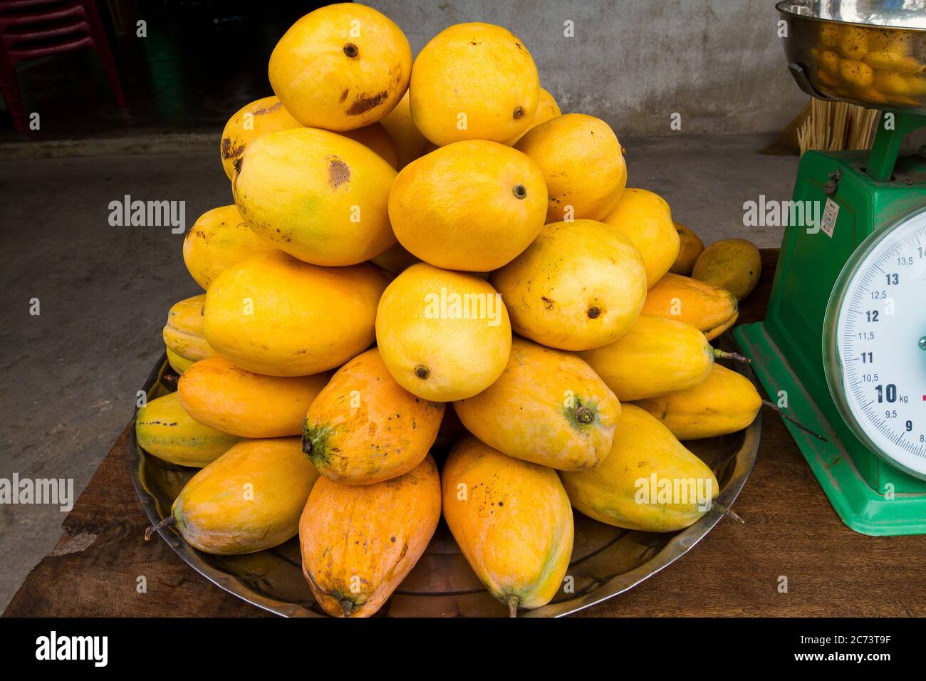 Mango and traditional scale in Vietnam. Streetmarket in Vietnam Stock