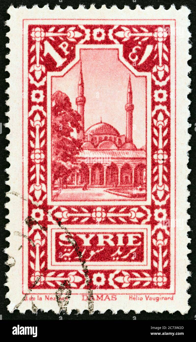 SYRIA - CIRCA 1925: A stamp printed in Syria shows Umayyad Mosque, Damascus, circa 1925. Stock Photo