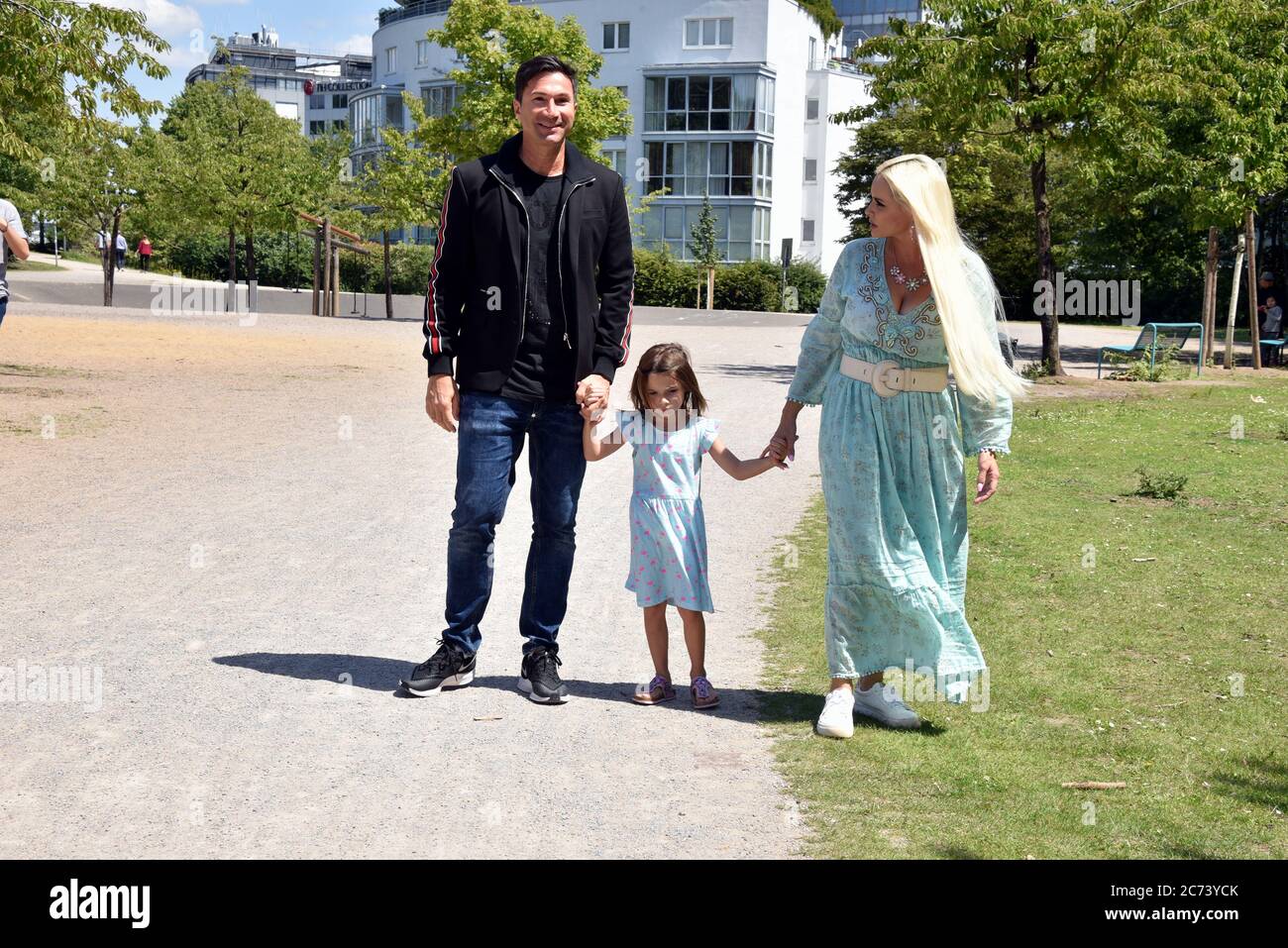 Cologne, Germany. 13th July, 2020. Daniela Katzenberger, her husband Lucas Cordalis and daughter Sophia present their new book " Mutti Mafia kann mich mal.gernhaben " on a playground Credit: Horst Galuschka/dpa/Alamy Live News Stock Photo