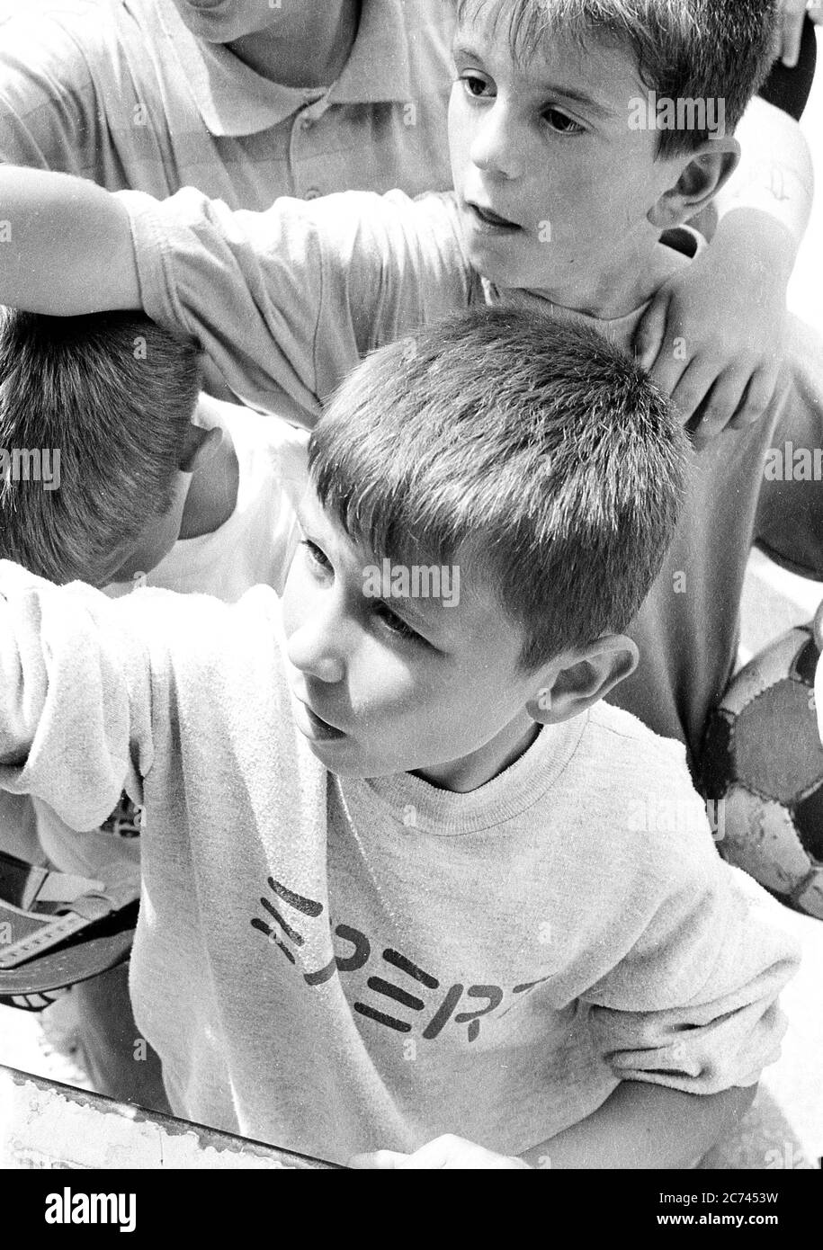 Bosnian Muslims receive aid from a British NGO who had travelled from the UK in convoy during the conflict in 1994 Stock Photo