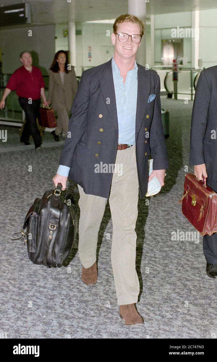Major James Hewitt leaving London's Heathrow Airport in 1996. Stock Photo