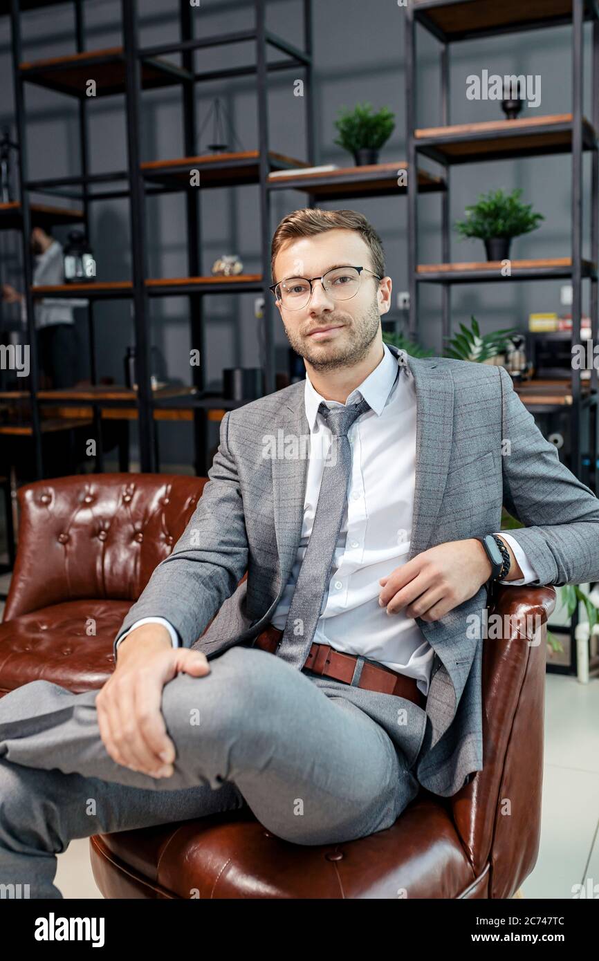 Portrait Of Young Caucasian Business Man In Tuxedo Confidently Looking At Camera Handsome Good Looking Guy In Modern Office Stock Photo Alamy