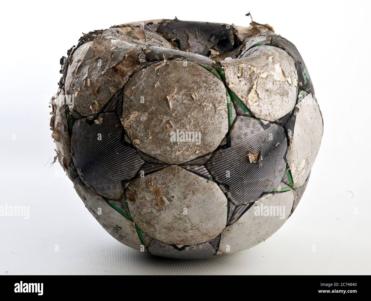 Damaged soccer ball Stock Photo Alamy