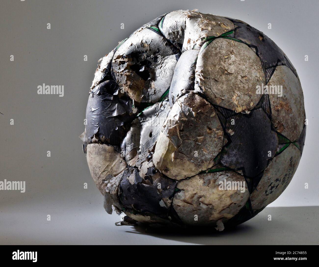 damaged soccer ball deformed shape waterlogged seams