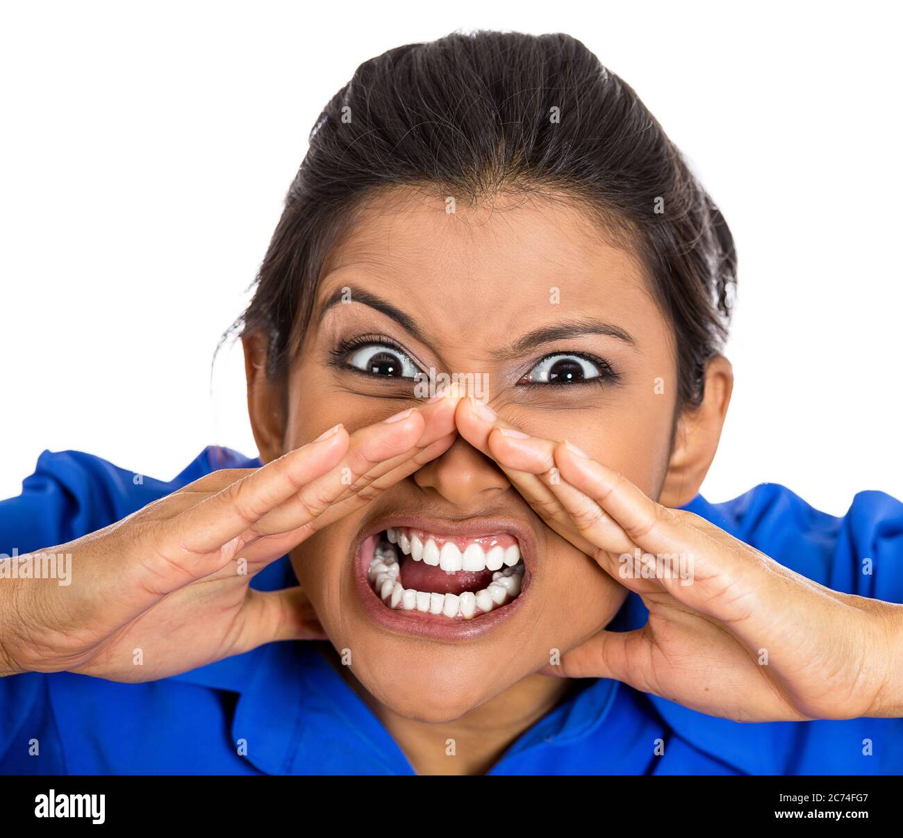 Portrait of a displeased angry, cranky, grumpy, woman screaming isolated on white background. Stock Photo