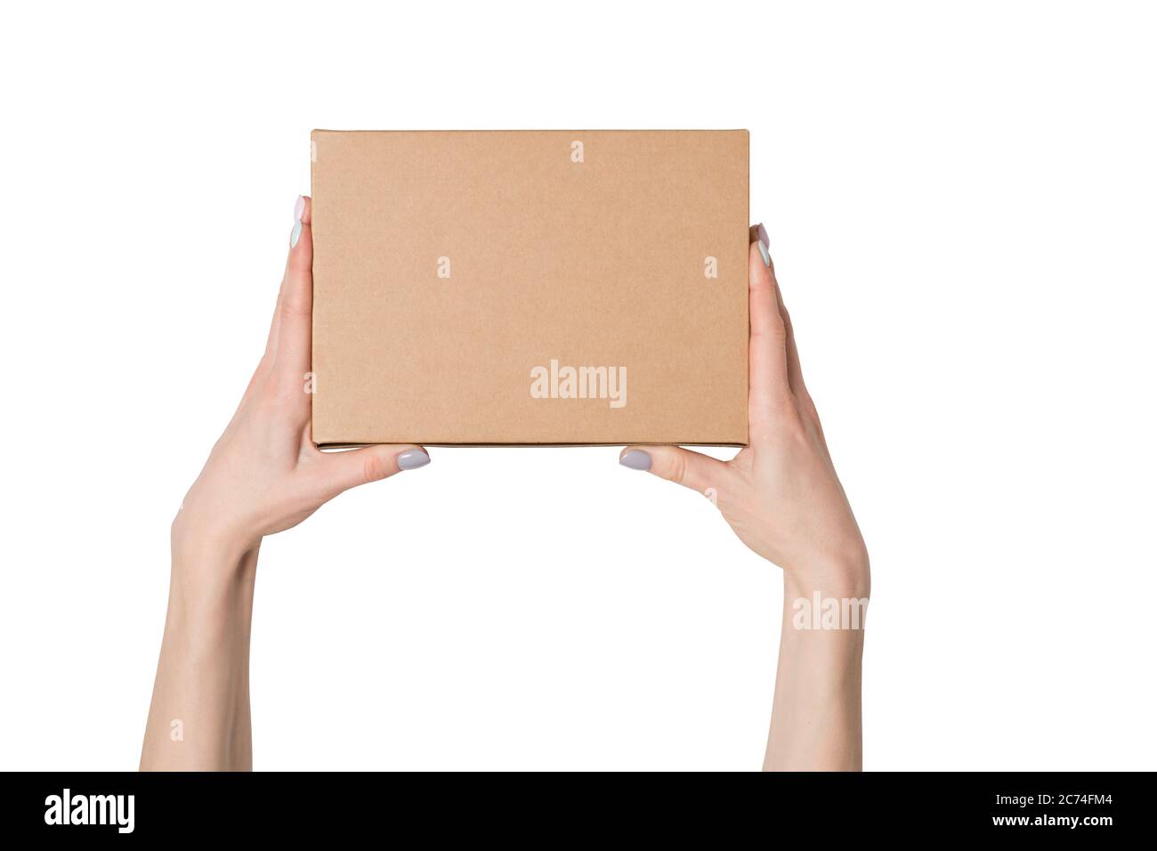 Rectangular box in female hands. Top view. Isolate Stock Photo