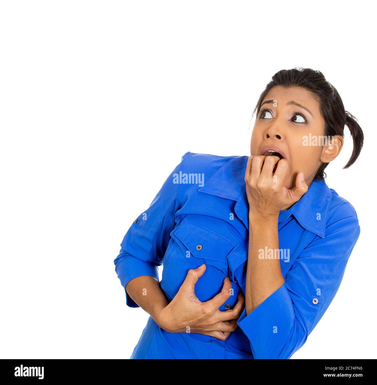 Scared, worry and face of Indian woman on pink background with