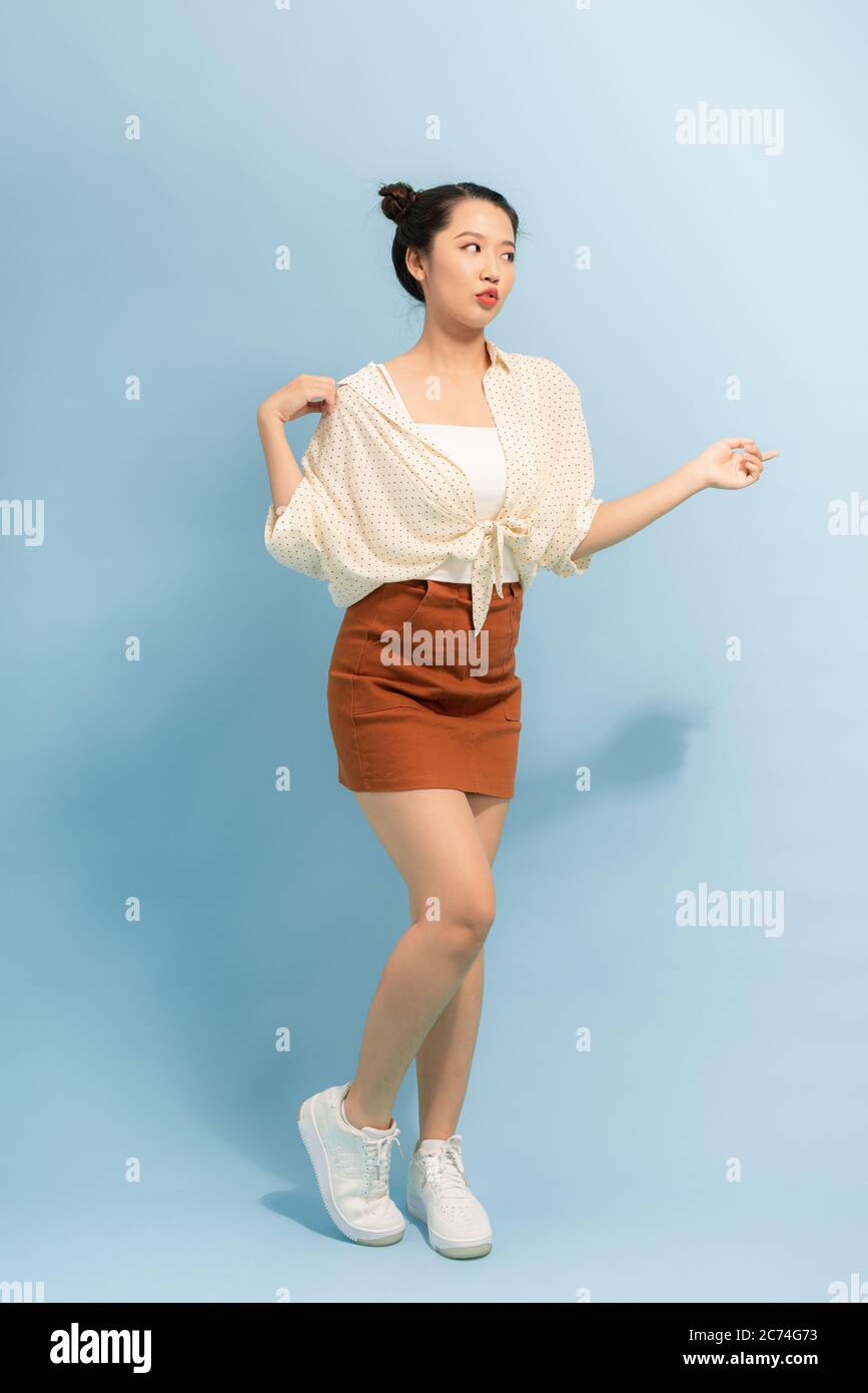 Full length photo of charming young woman in casual wear summer clothes ...