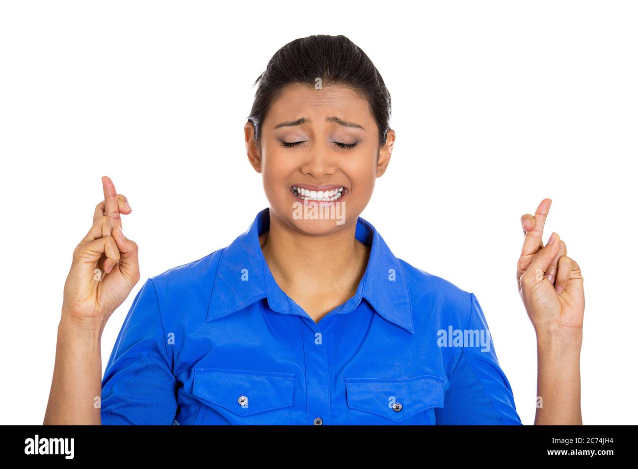 Fingers crossed woman hi-res stock photography and images - Alamy