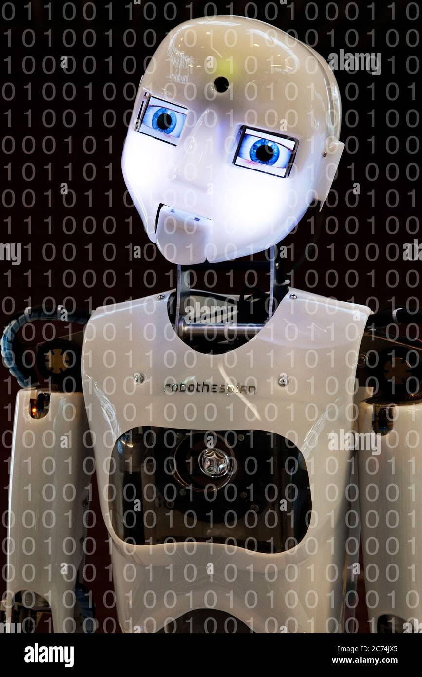 humanoid robot with binary code, Germany Stock Photo