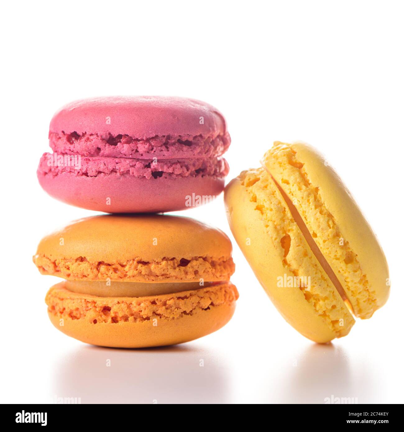 Three macaroons on white background. Stock Photo