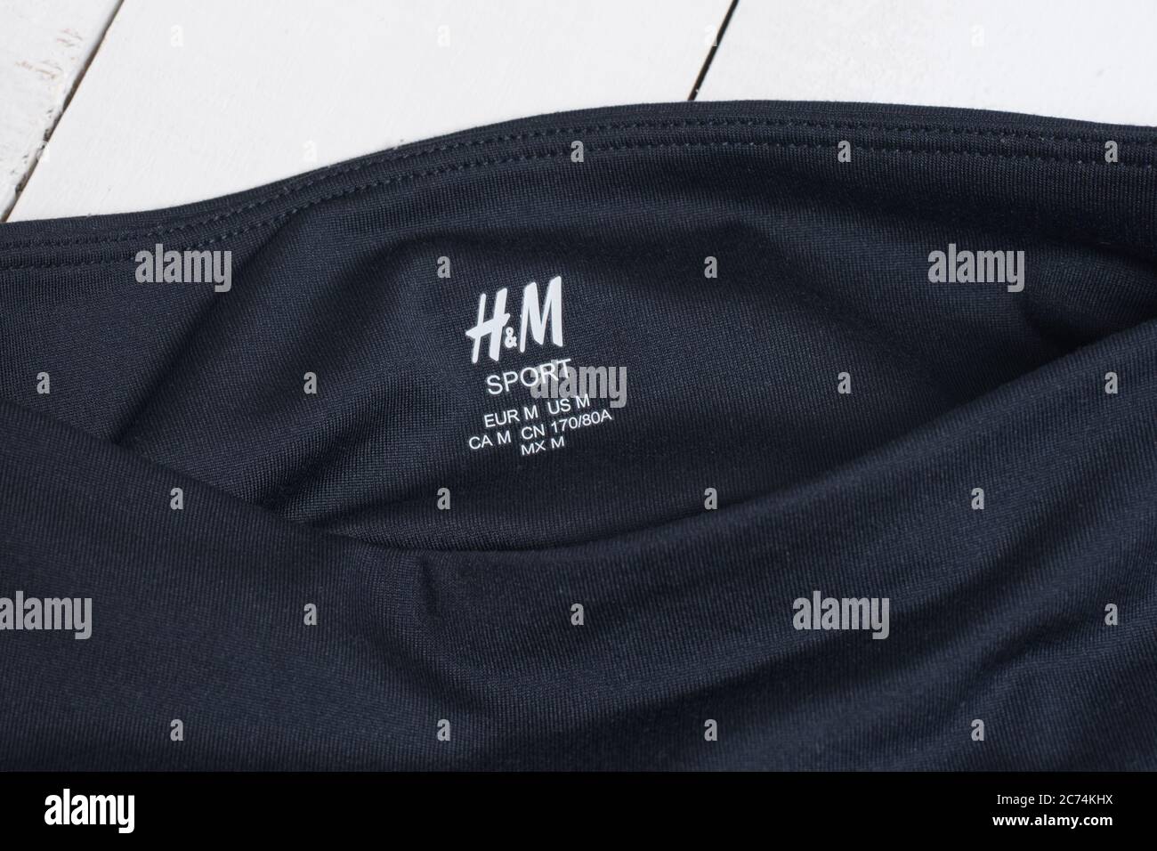 KHARKOV, UKRAINE - MARCH 04, 2019: Inscription H&M SPORTon navy blue  clothes. Fashion concept. Close up Stock Photo - Alamy