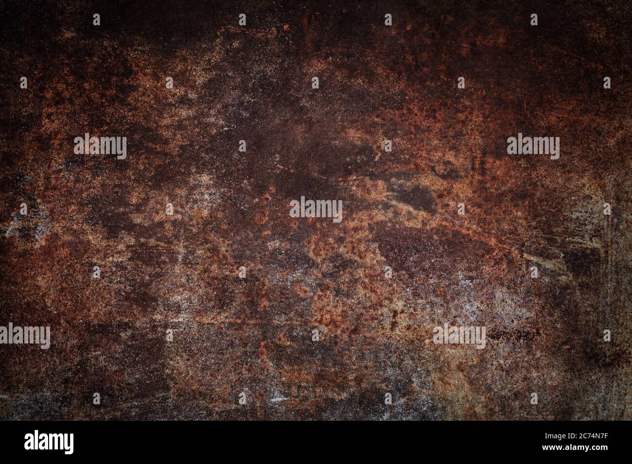 Abstract of a grunge rusted metal background with rust and oxidized texture. Stock Photo
