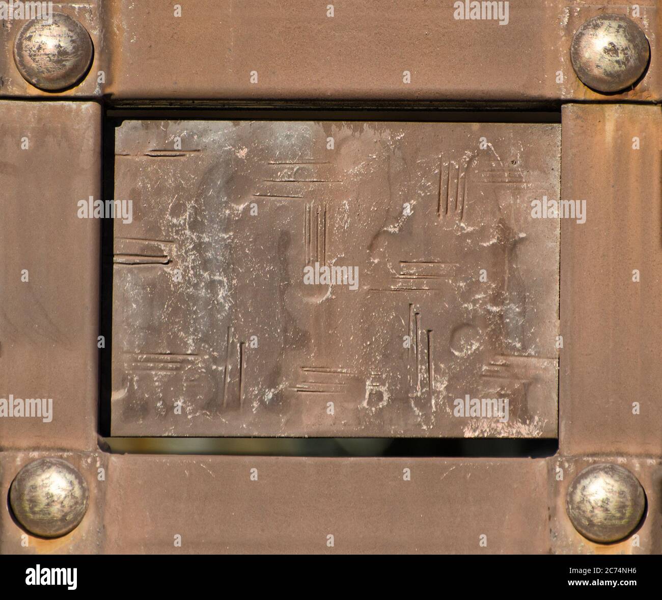 Vintage rectangular plate in metal frame with rivets Stock Photo - Alamy