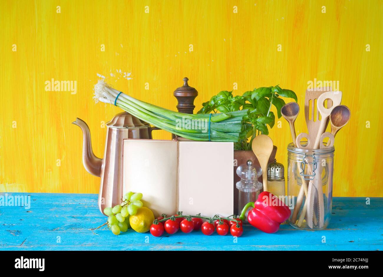 cookbook, vegetables, old kitchen utensils, free copy space Stock Photo