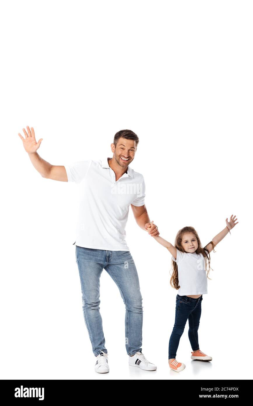 cheerful father and daughter holding hands on white Stock Photo - Alamy