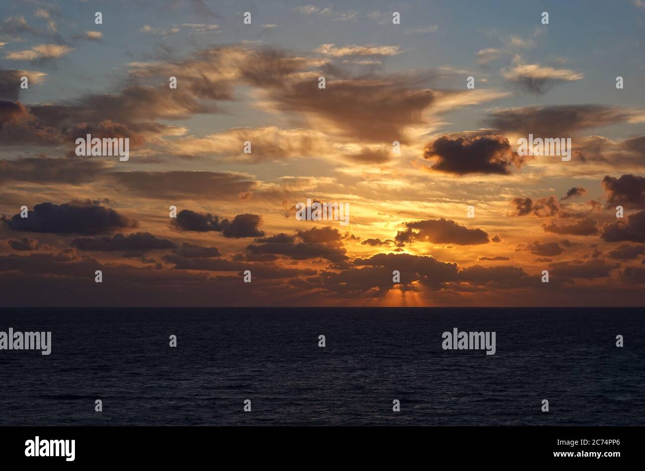 A colorful sunrise over the Atlantic ocean on a beautiful summer ...