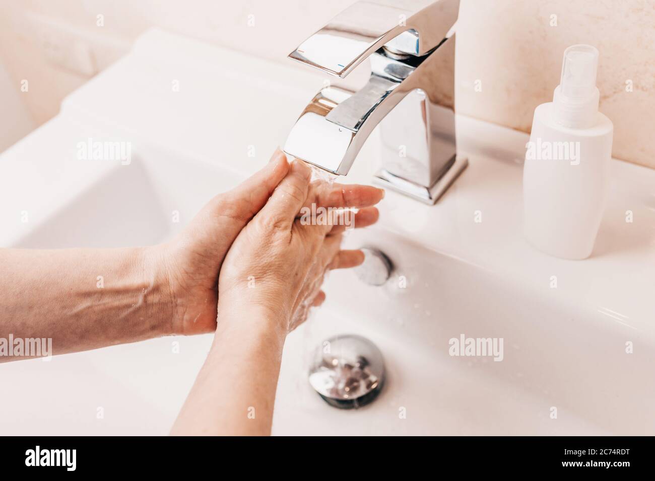 Regular hand washing warm water with soap for disinfection personal