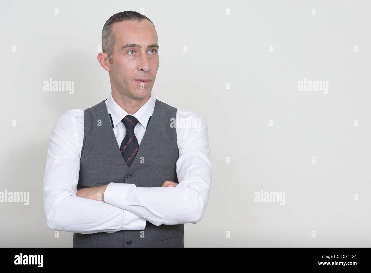 Portrait of mature handsome businessman with waistcoat Stock Photo - Alamy