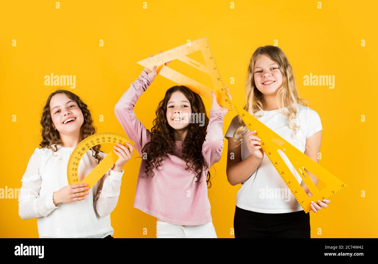Woman Triangle Math Inspired to work hard. three girls with protractor and triangle ruler ...