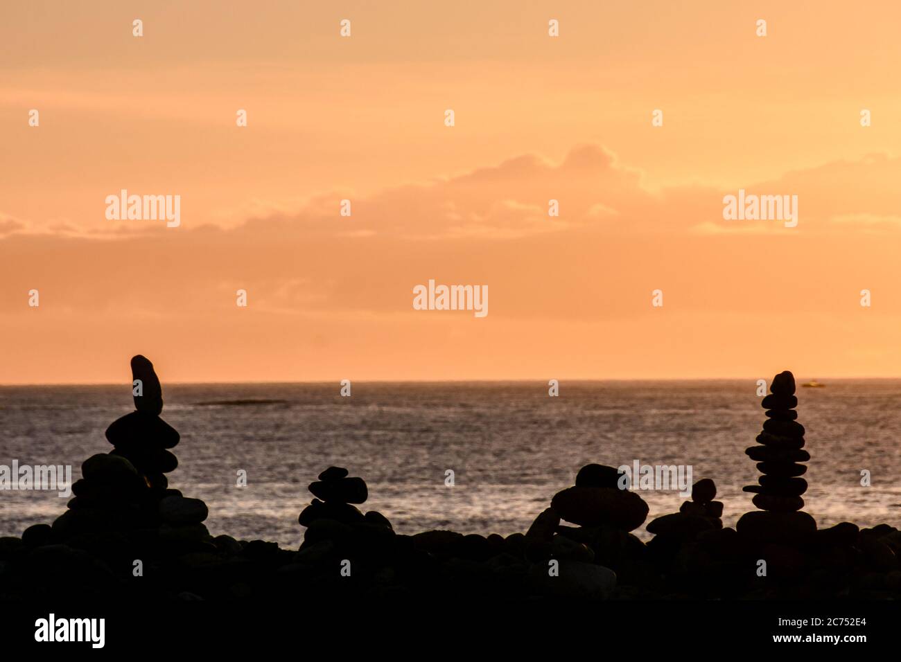 Photo Picture Stack of stones on the sea beach Stock Photo - Alamy