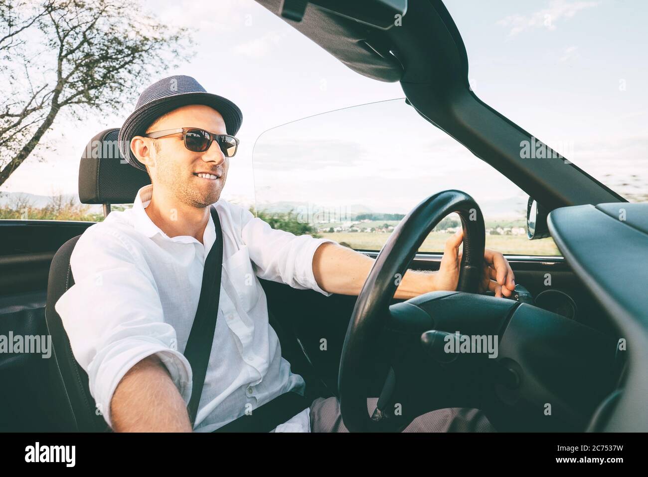 Old man driving luxury car hi-res stock photography and images - Alamy