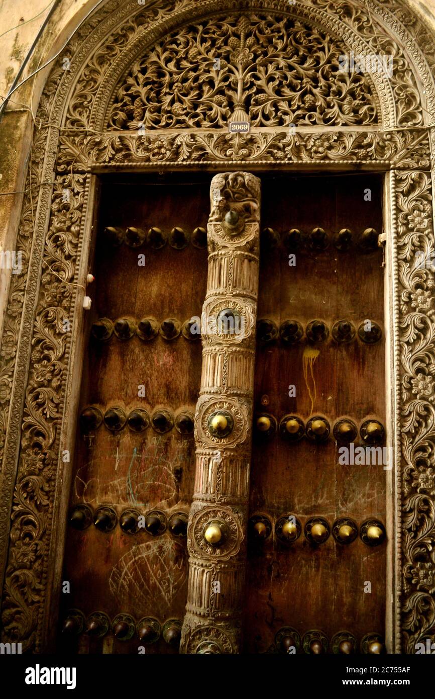 Carved wooden doors of stone town Stock Photo - Alamy