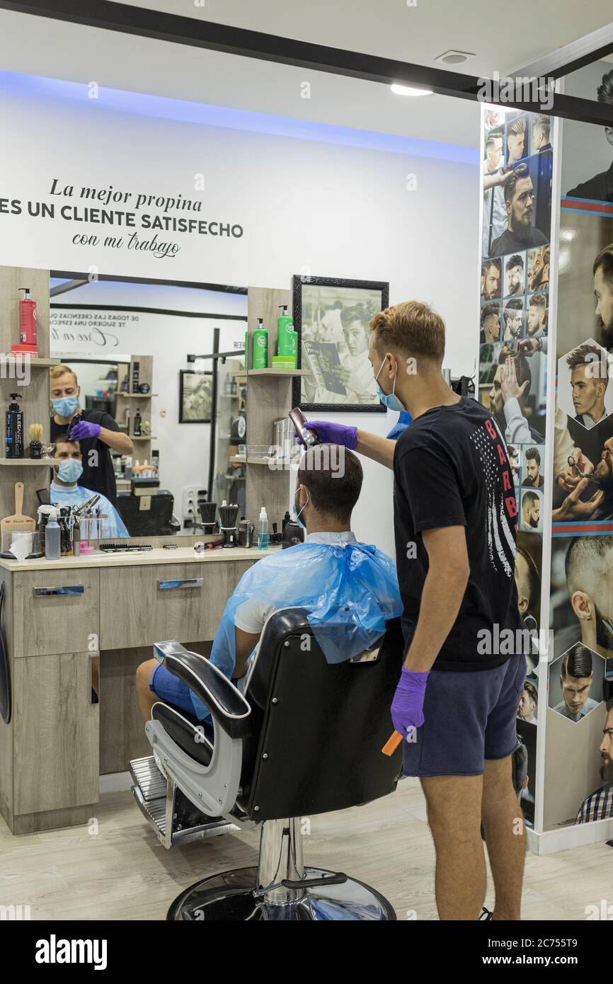 Barbers shop, American style in Gran Sur shopping mall with mask