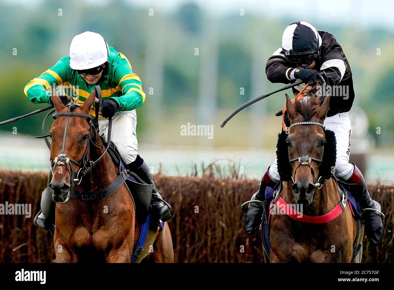 As You Like ridden by jockey Jonjo O'Neill Jr (left) clears the last to win The Sign Solutions Nottingham Handicap Steeple Chase at Southwell Racecourse. Stock Photo